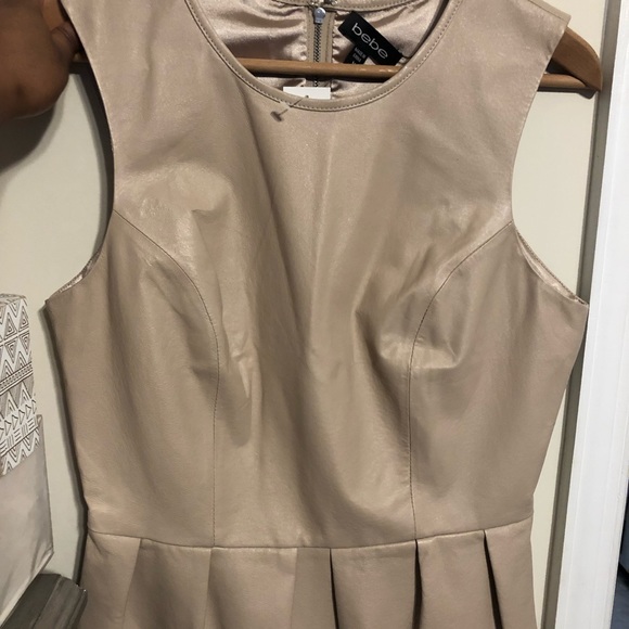 bebe Tops - Bebe Leather peplum top